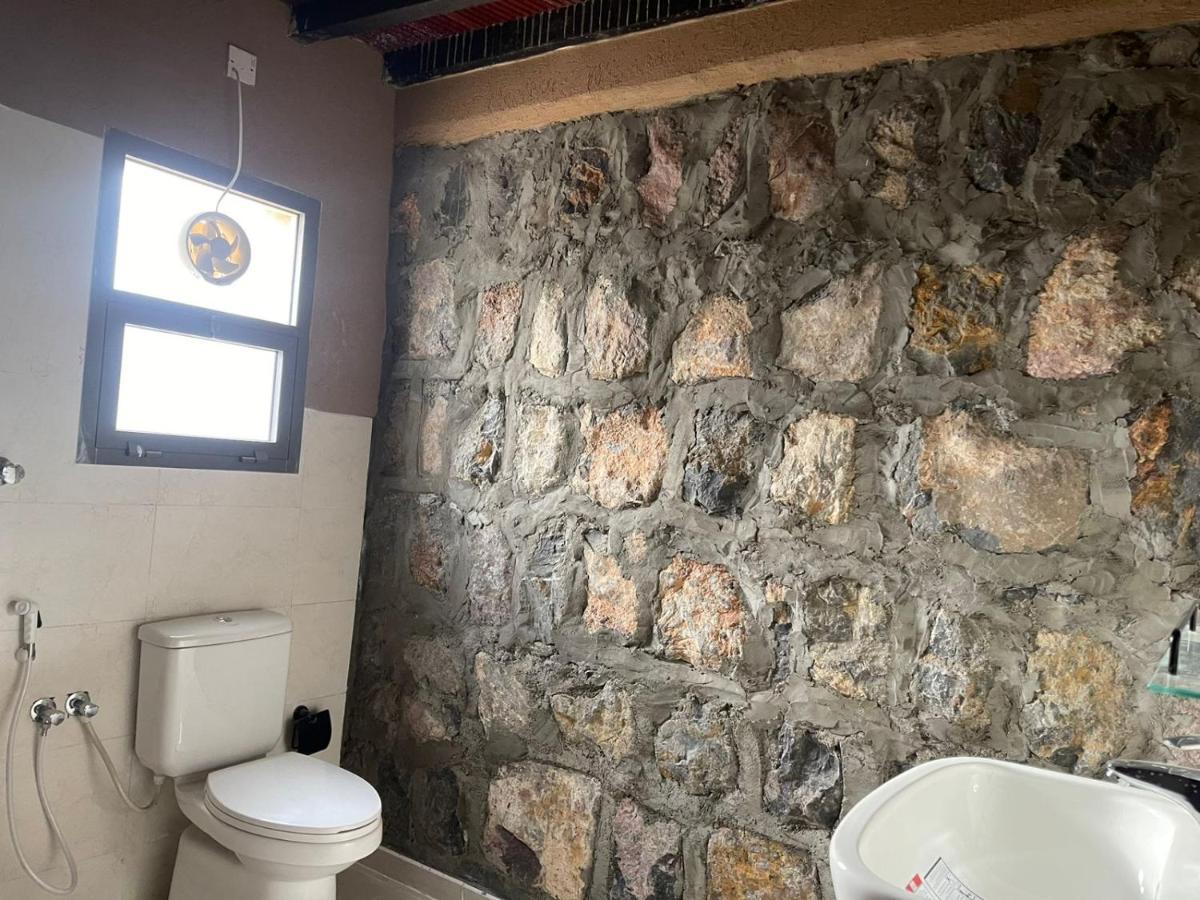 Rose Guesthouse Al 'Aqar Esterno foto